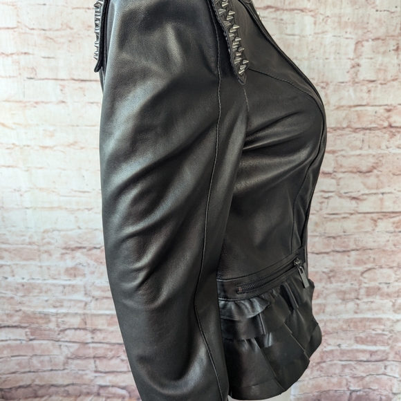 bebe Black Leather Jacket with Edgy Shoulder Design and Tailored Fit - Picture 9 of 16